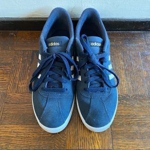Women’s navy suede Adidas shoes.